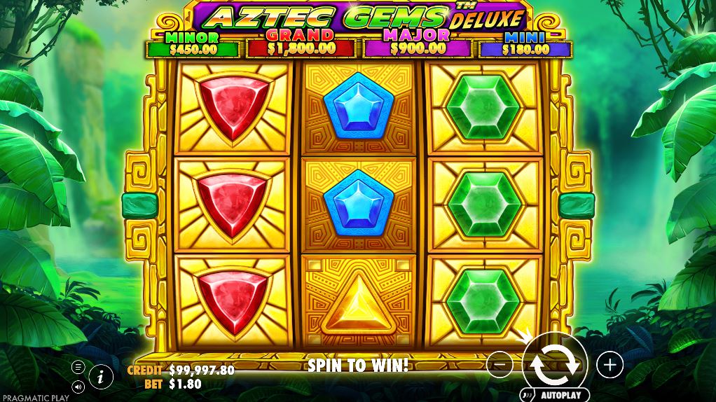 Aztec Gems Deluxe slot base game screen with colorful gem symbols on the 3x3 grid.