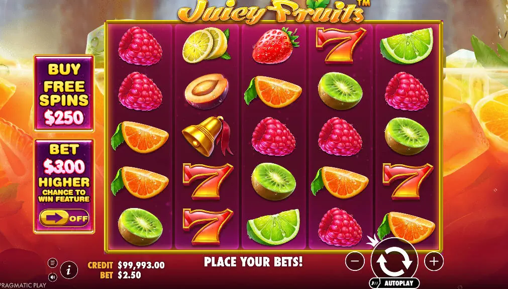 The 5x5 game grid of the Juicy Fruits slot during base gameplay, showing a variety of fruit symbols and the cocktail-themed background, which establishes the game's setting.