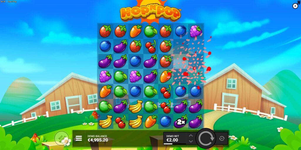 Winning cluster of strawberry symbols exploding in Hop 'N' Pop slot, triggering the cascade feature.