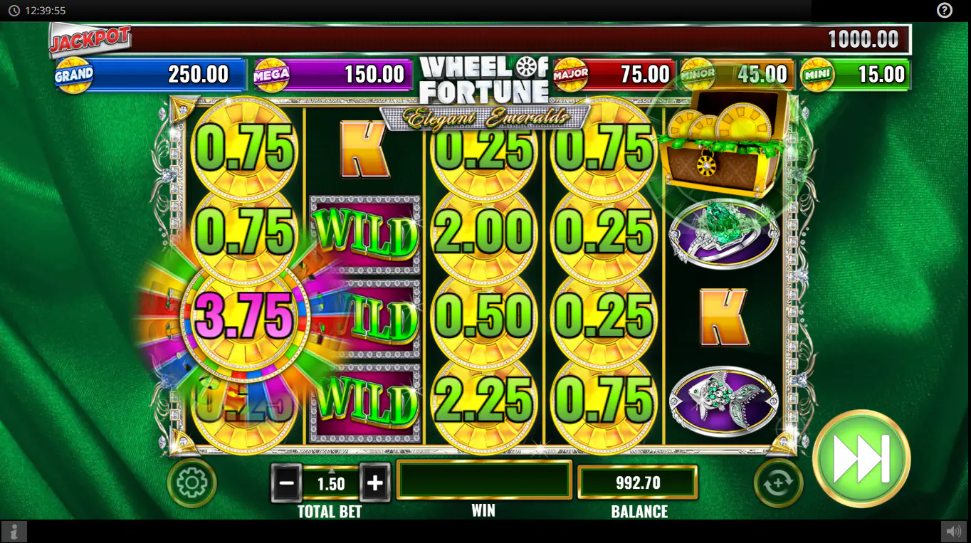 Triggering the Wheel Bonus in Wheel of Fortune Elegant Emeralds, with the Wheel symbol on reel 1 and Chest on reel 5, demonstrating the requirements for the main feature.