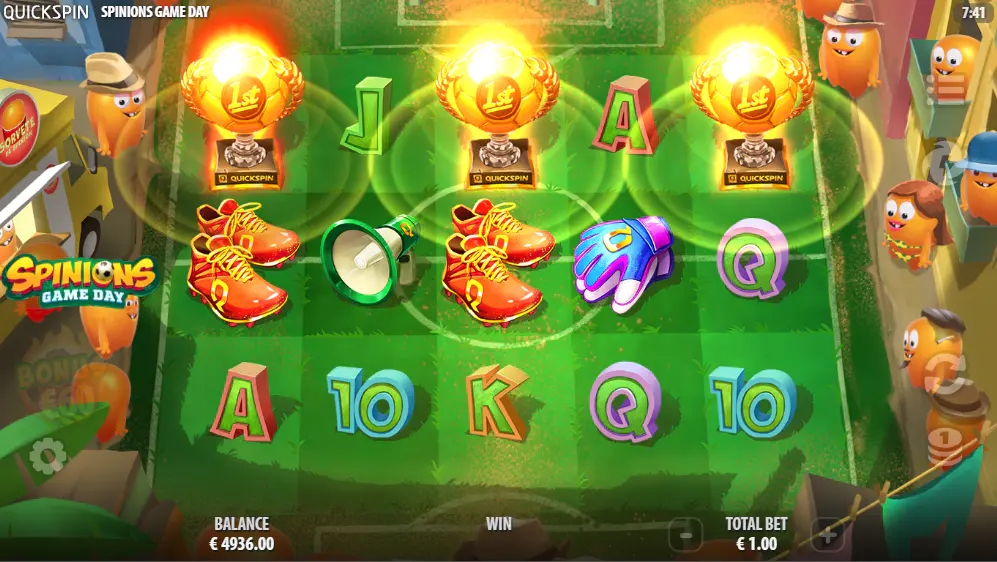 Three trophy scatter symbols on reels 1, 3, and 5, triggering the Game Day Free Spins bonus round in the Spinions Game Day slot.