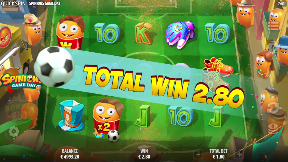 A wild symbol with an x2 multiplier during a re-spin in Spinions Game Day, showing the potential for increased payouts from the feature.