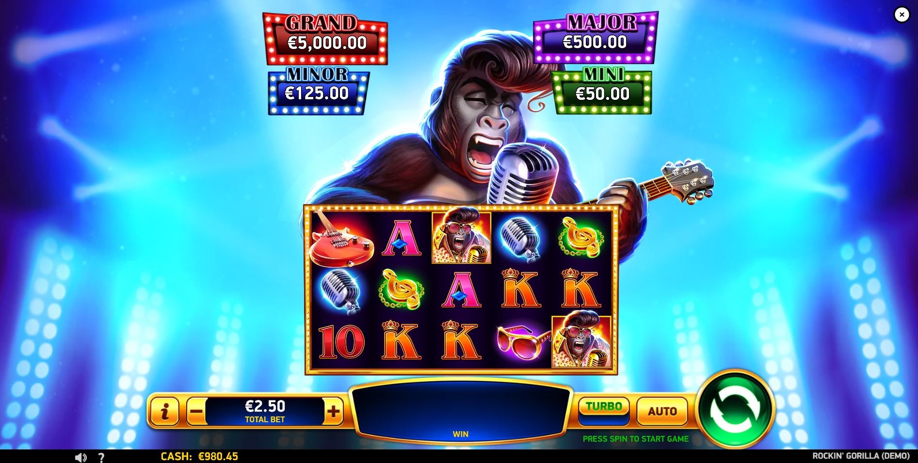 The main 5x3 game grid of the Rockin' Gorilla slot, with the rockstar gorilla Wild symbol visible on the stage-lit reels.
