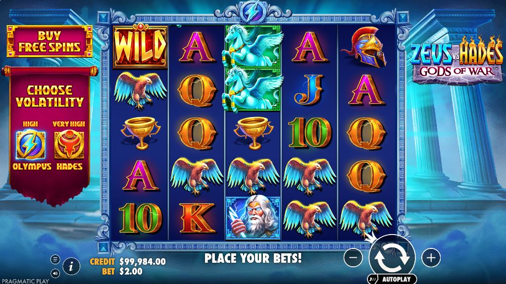 The 5x5 grid of the Zeus vs Hades slot in Olympus mode, showing the serene blue background and high-paying symbols.