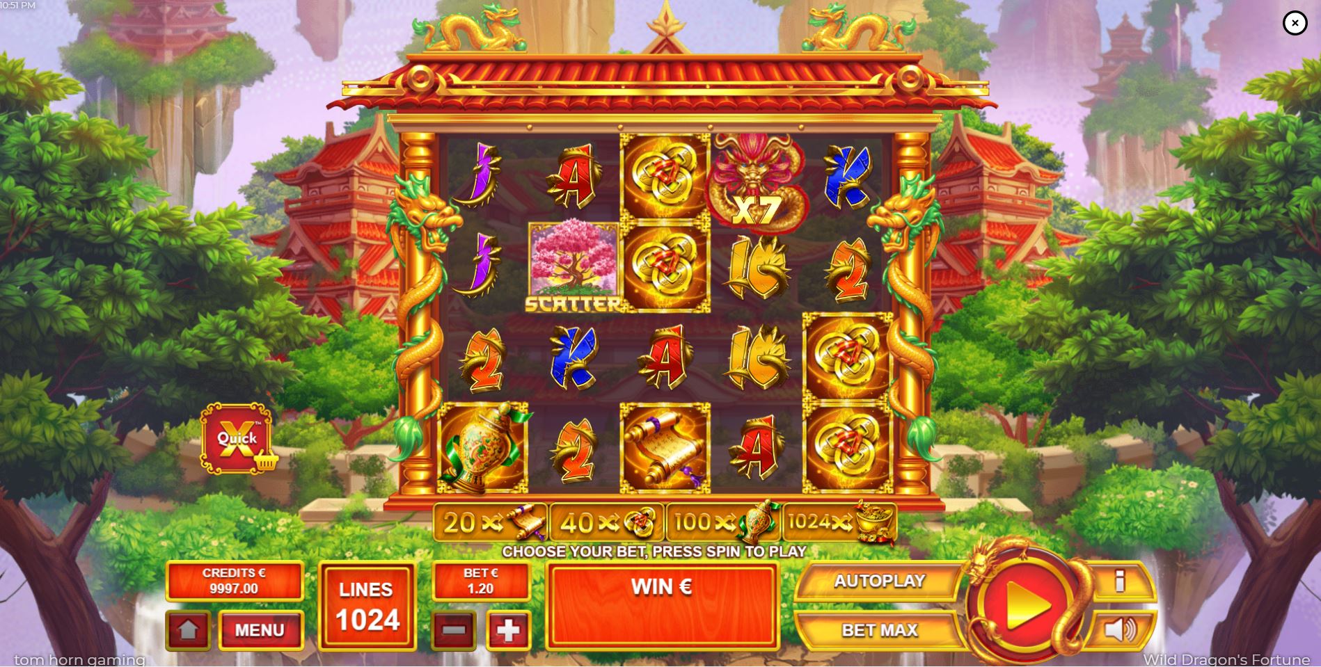 The main game screen of the Wild Dragon's Fortune slot, showing the 5x4 reel layout set against a fantasy Asian landscape.