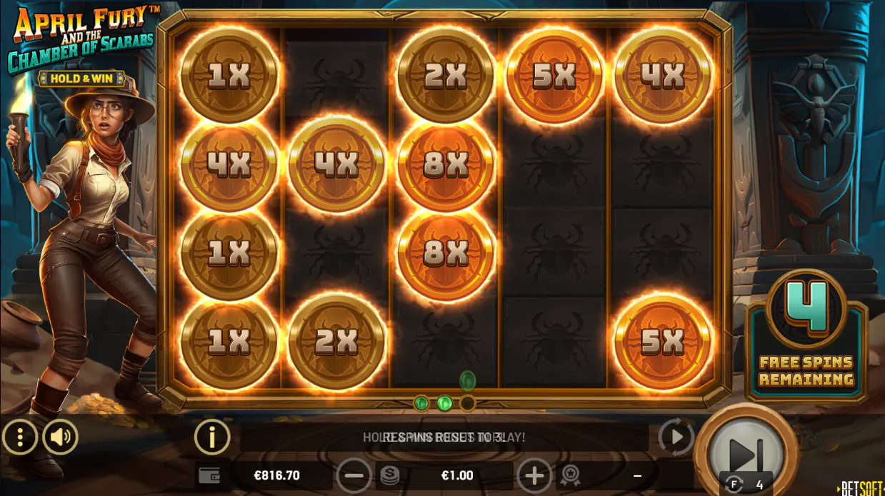The Hold & Win bonus round in April Fury in mid-play, showing locked multiplier coins and empty spaces, highlighting the chase for a full screen.