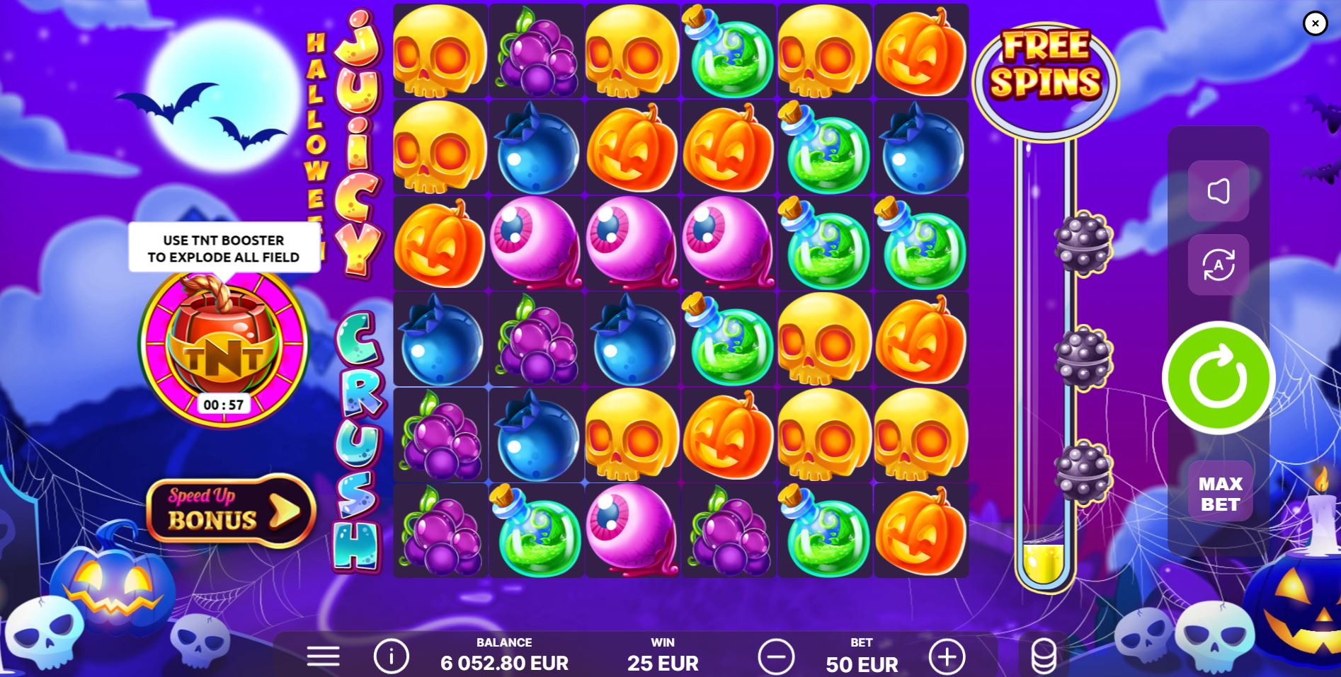 The TNT Booster icon is fully charged and ready for activation in the Juicy Crush Halloween slot.