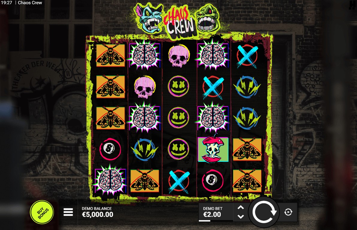 The 5x5 game grid of the Chaos Crew slot, set against a graffiti-covered brick wall, showcasing the game's punk aesthetic.