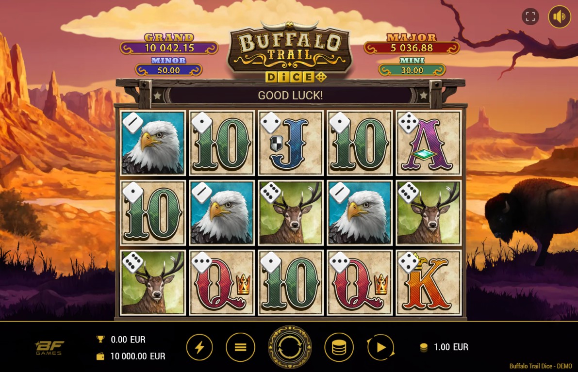 The 5x3 game grid of the Buffalo Trail Dice slot, showing wildlife symbols against a canyon sunset backdrop.