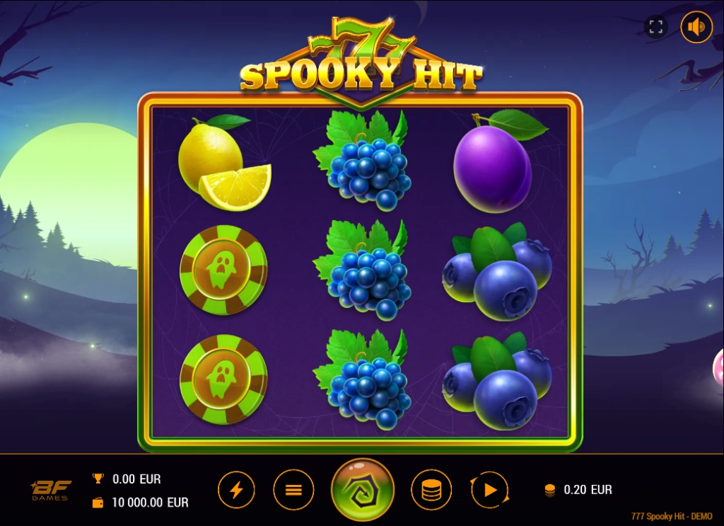 The 3x3 reel layout of the 777 Spooky Hit slot, showing the fruit and ghost chip symbols during base gameplay.