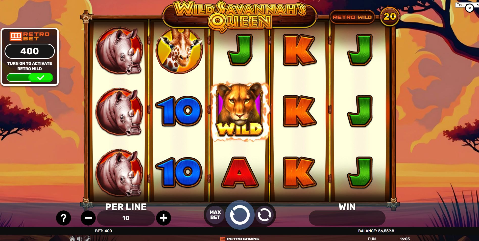 The 5x3 game grid of Wild Savannah's Queen slot, showing various animal symbols against a sunset background.