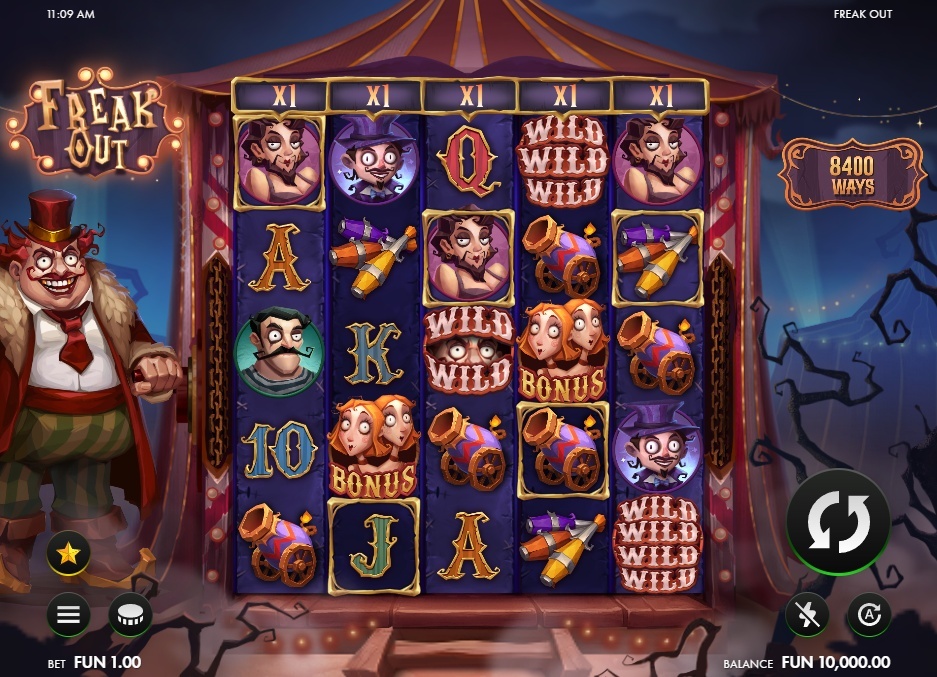 The main game screen of the Freak Out slot, showing the 5-reel layout and creepy circus theme.