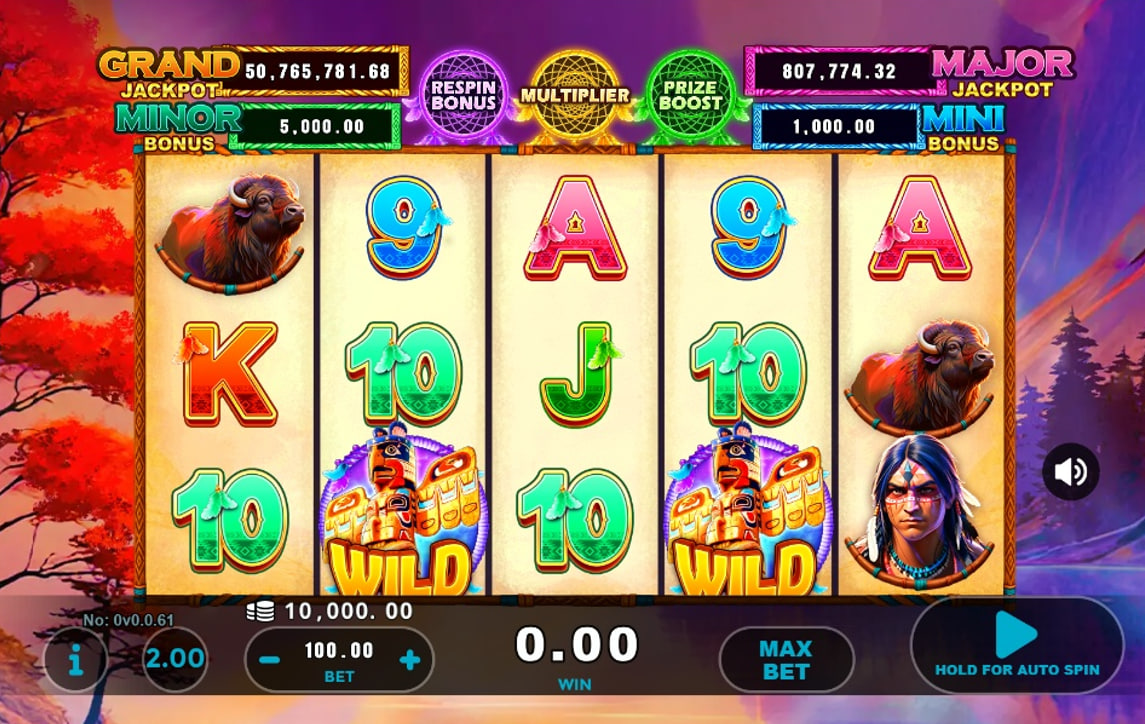 A screenshot of the Magical Dream Catcher slot's base game, featuring the 5x3 reels with Native American-themed symbols, four jackpots, and special bonus orbs at the top.