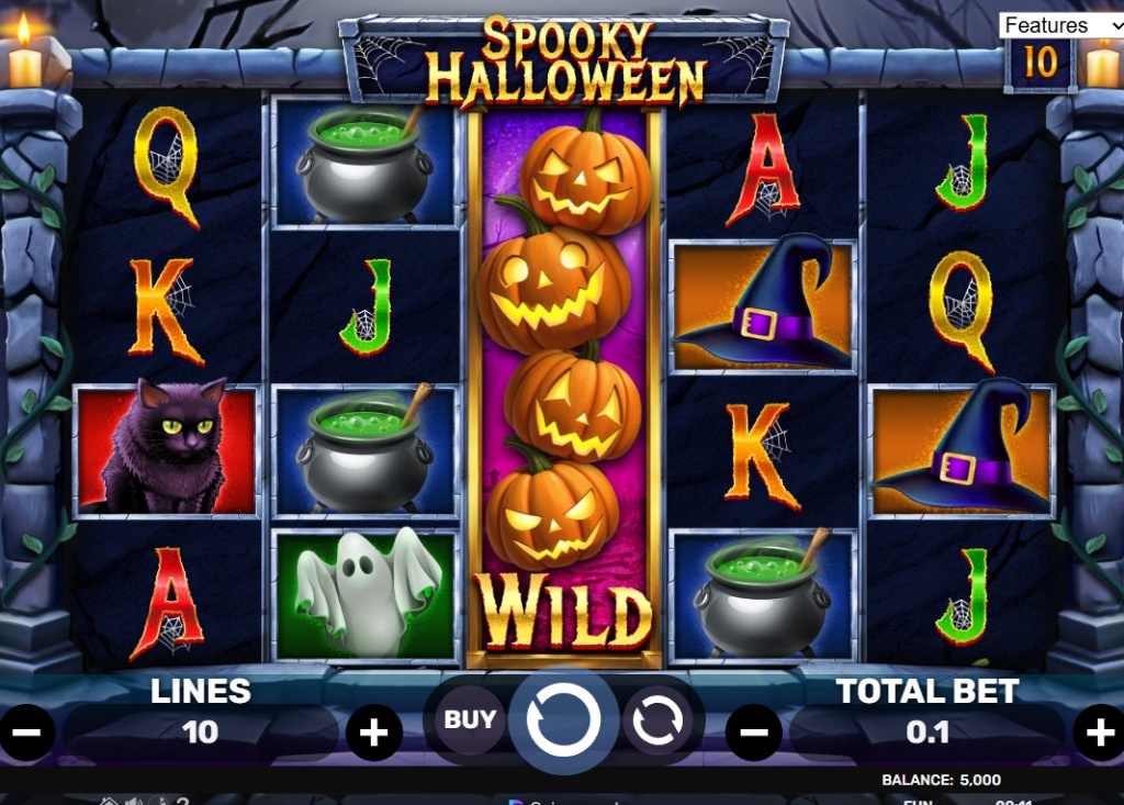 The base game grid of the Spooky Halloween slot, showing 5 reels, 3 rows, and Halloween-themed symbols.