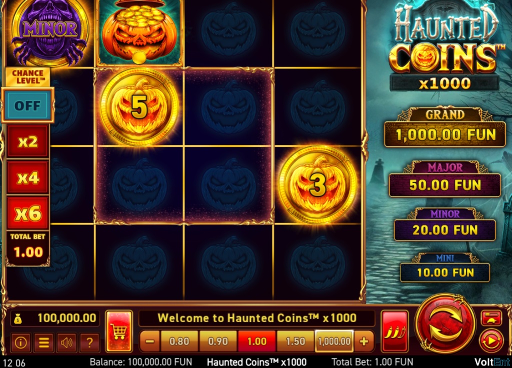 The 4x4 reel layout of the Haunted Coins slot, showcasing the central highlighted trigger area and Halloween-themed design.