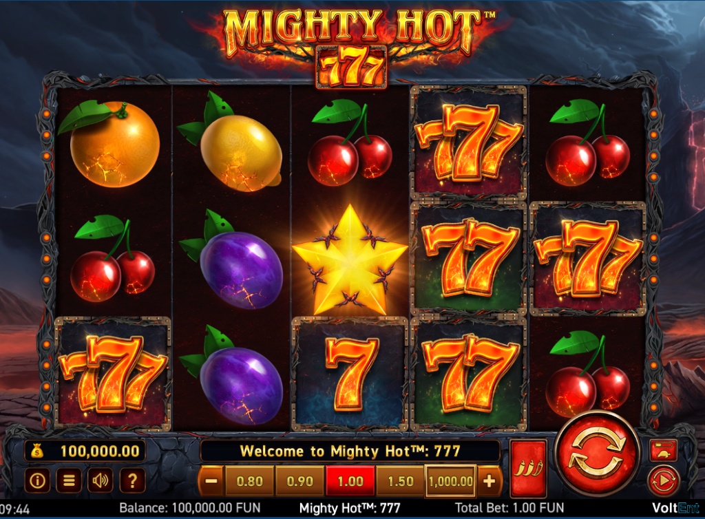 The 5x3 reel layout of the Mighty Hot 777 slot, showcasing the classic fruit and seven symbols against a fiery volcanic backdrop.
