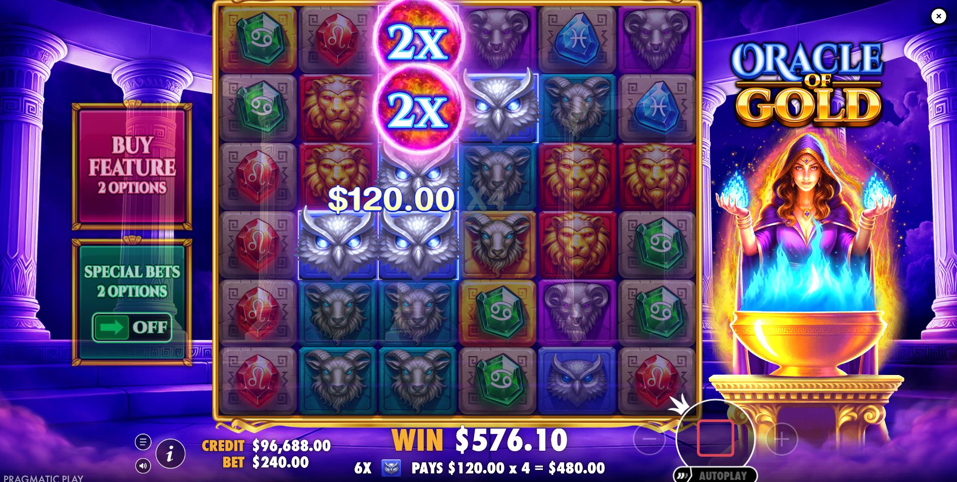 A winning cluster of high-value Owl symbols highlighted on the Oracle of Gold game grid before a tumble sequence.