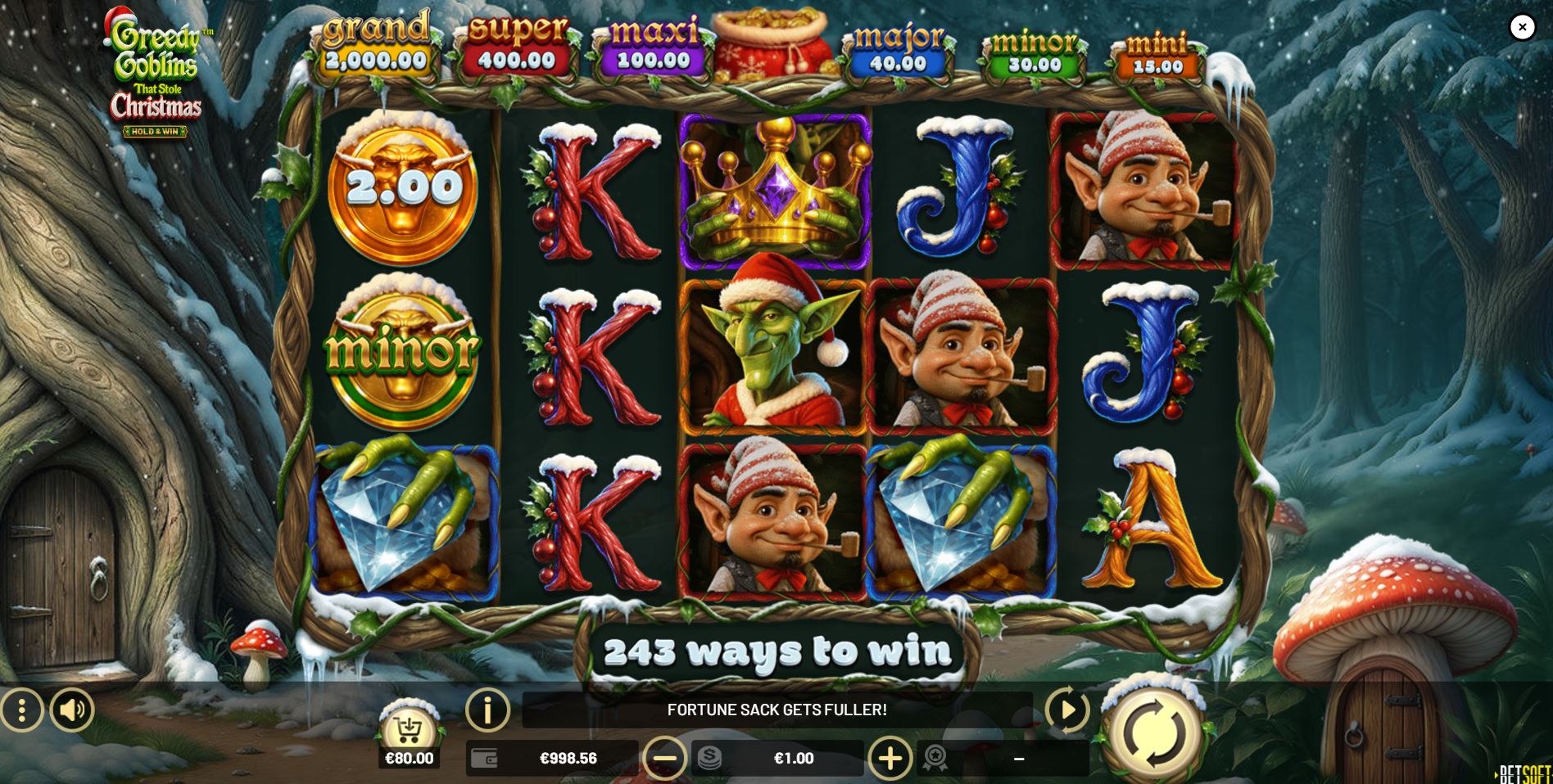 The main 5x3 game grid of the Greedy Goblins That Stole Christmas slot, showing the goblin characters and snowy forest background.