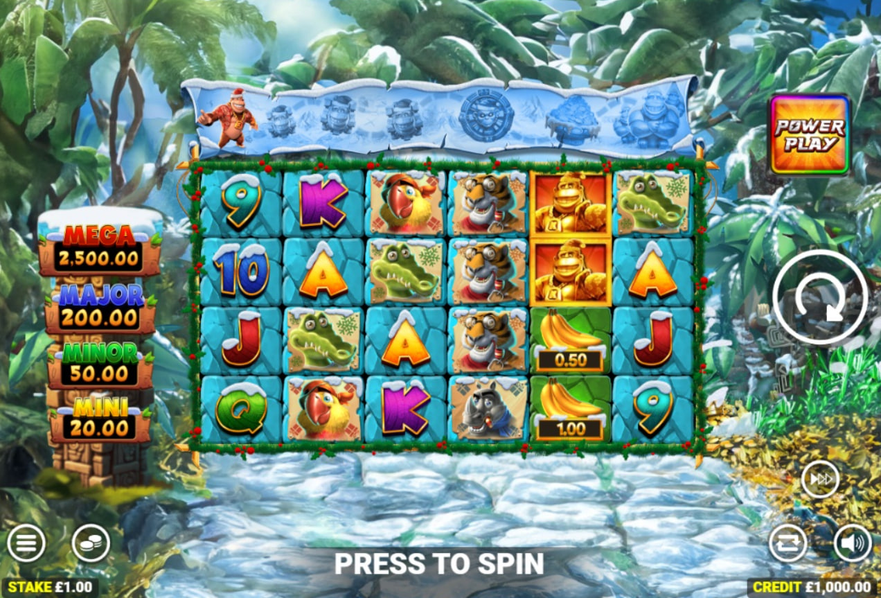 Kong Even Bigger Christmas slot base game 6x4 grid with winter jungle background.