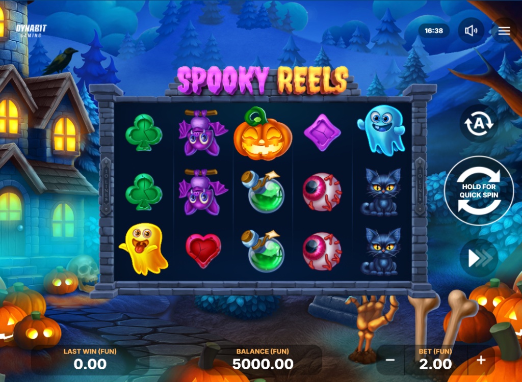 The main 5x3 reel layout of the Spooky Reels slot by Dynabit Gaming, showing the haunted house background and cartoon symbols.