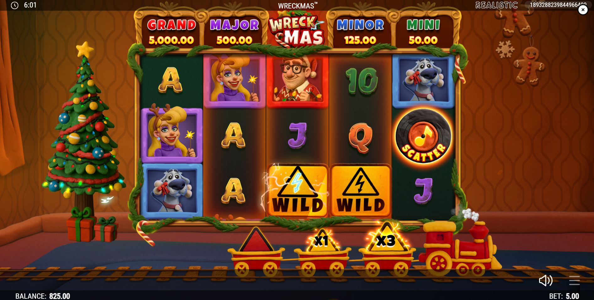 The Wild Train feature activated in the Wreckmas slot, with a toy train carrying carts displaying x2 and x3 multipliers below the game reels.