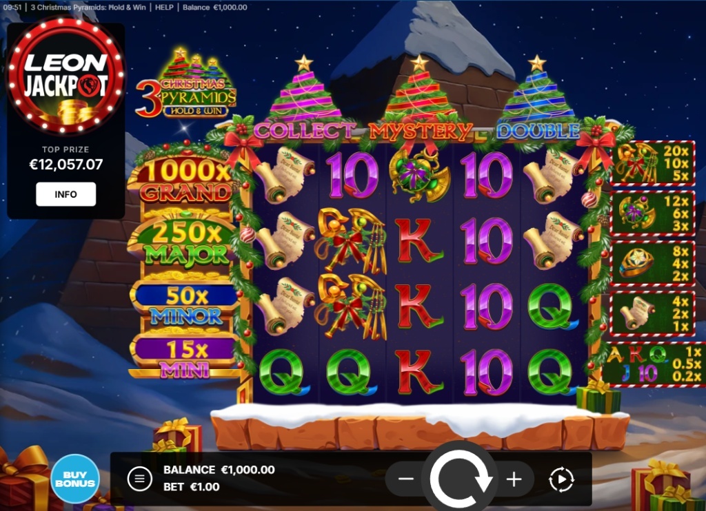 3 Christmas Pyramids slot base game with 5x4 grid and snow-covered Egyptian temple background.