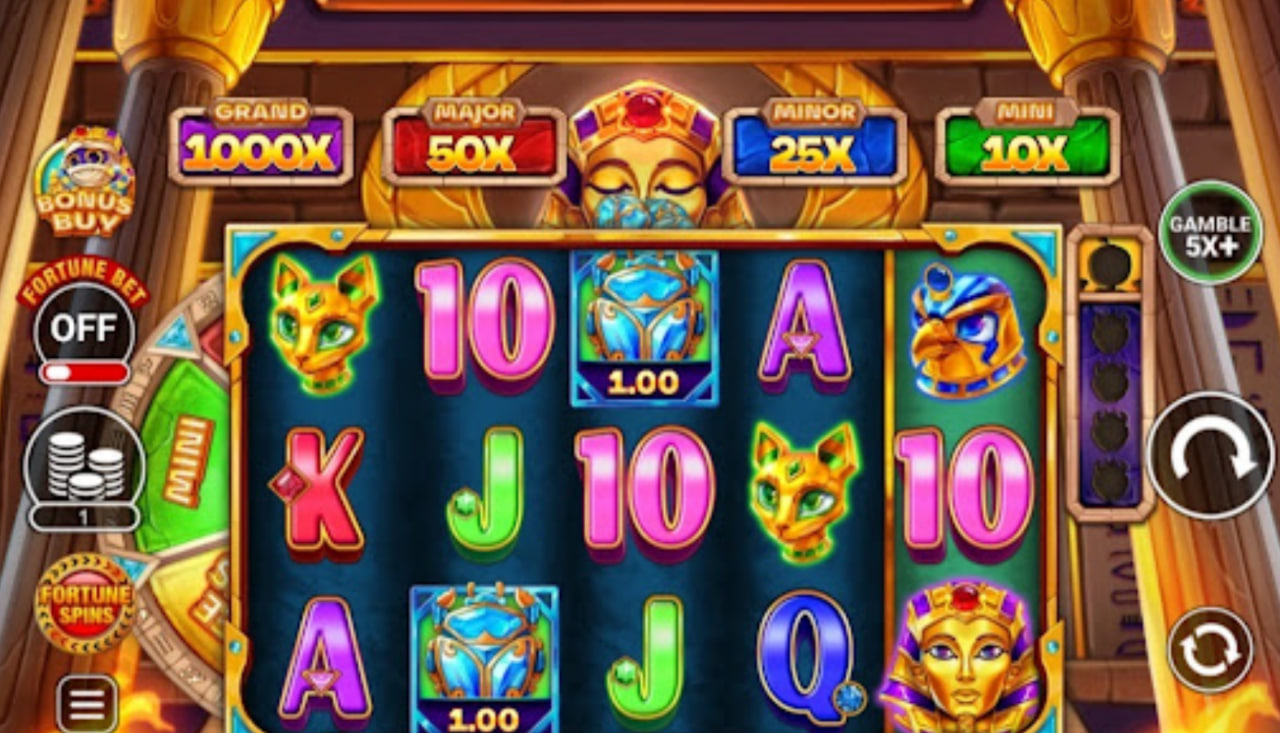 Mummy It Up slot base game interface showing 5x3 grid with Egyptian symbols and torch animations by Inspired Gaming.