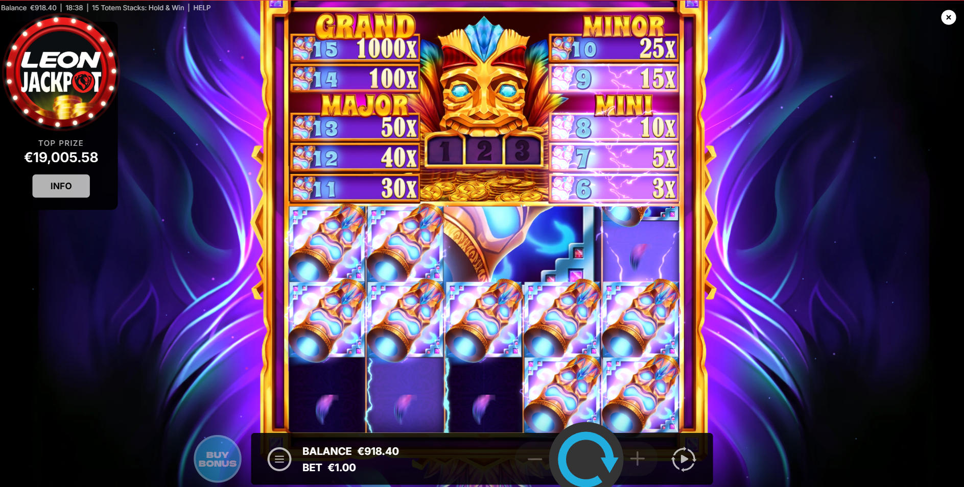 The Hold & Win bonus round in 15 Totem Stacks with 11 Totems locked on the reels, illustrating the tense prize collection mechanic.