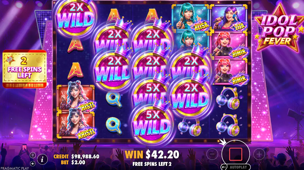 Multiple wild symbols with 2x and 5x multipliers active on the reels during the Idol Pop Fever free spins round, showing its win potential.