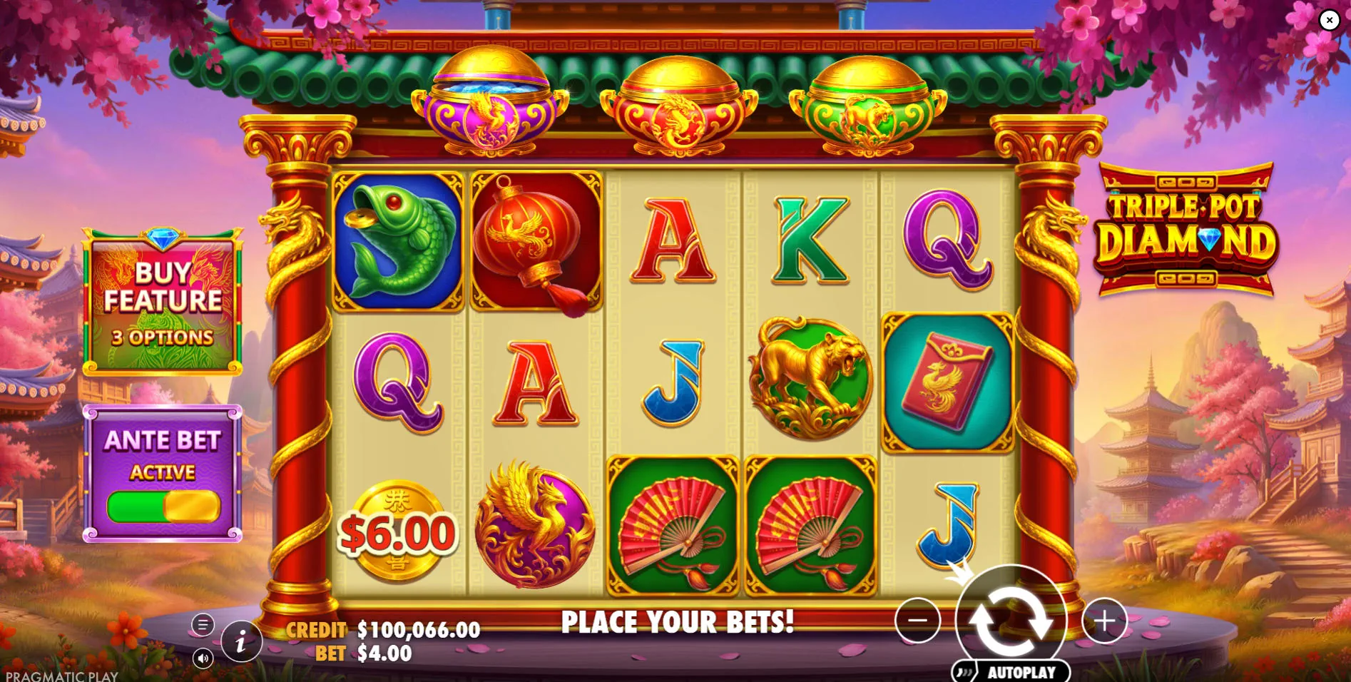 The 5x3 base game grid of Triple Pot Diamond showing the three collection pots above the reels, preparing players for the scatter mechanic.