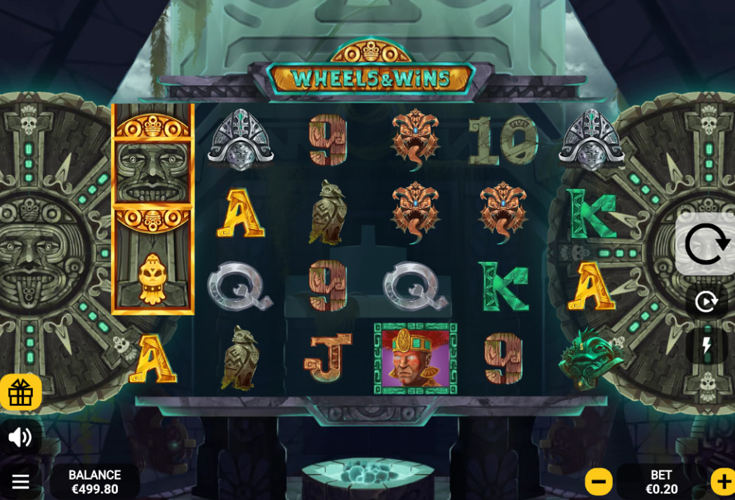 Wheels & Wins slot main game 6x4 grid with Aztec mask symbols and stone reel design.