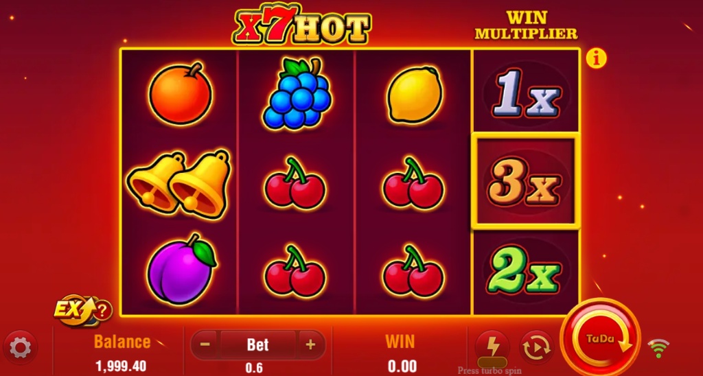 X7-Hot slot base game interface showing 3 reels and the special multiplier reel on the right with fruit symbols like oranges and grapes.