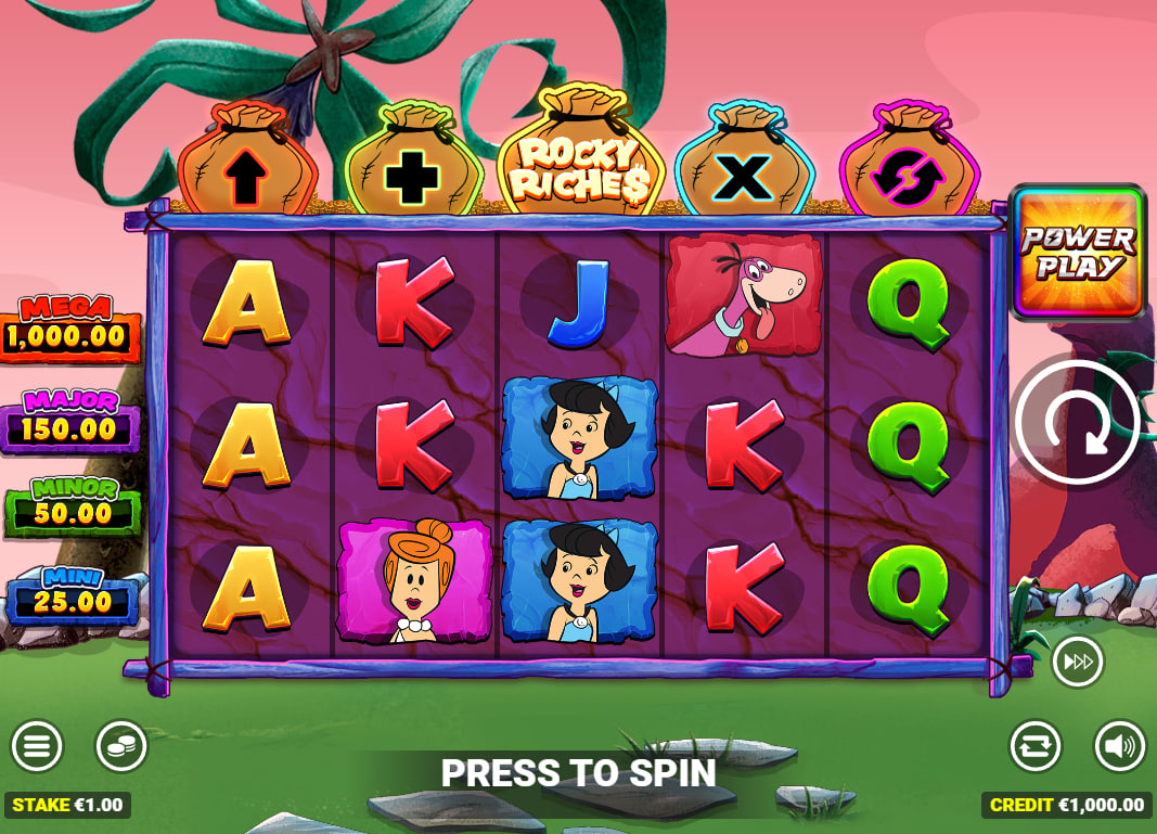 The base game grid of The Flintstones Rocky Riches slot, showing the 5x3 reel layout and the five Progressive Bank meters above, illustrating the starting gameplay for the player.