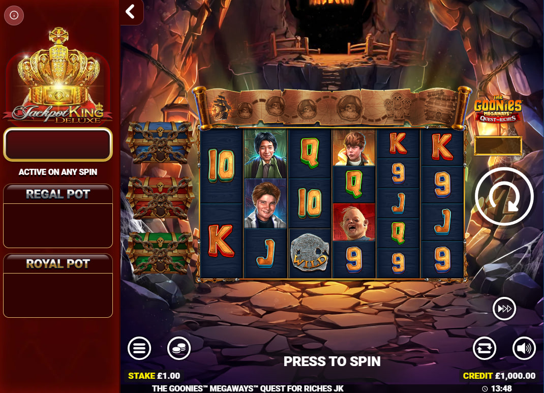 The base game grid of The Goonies Megaways Quest for Riches slot, showing the 6 reels and character symbols inside a treasure cave, ready for a spin.