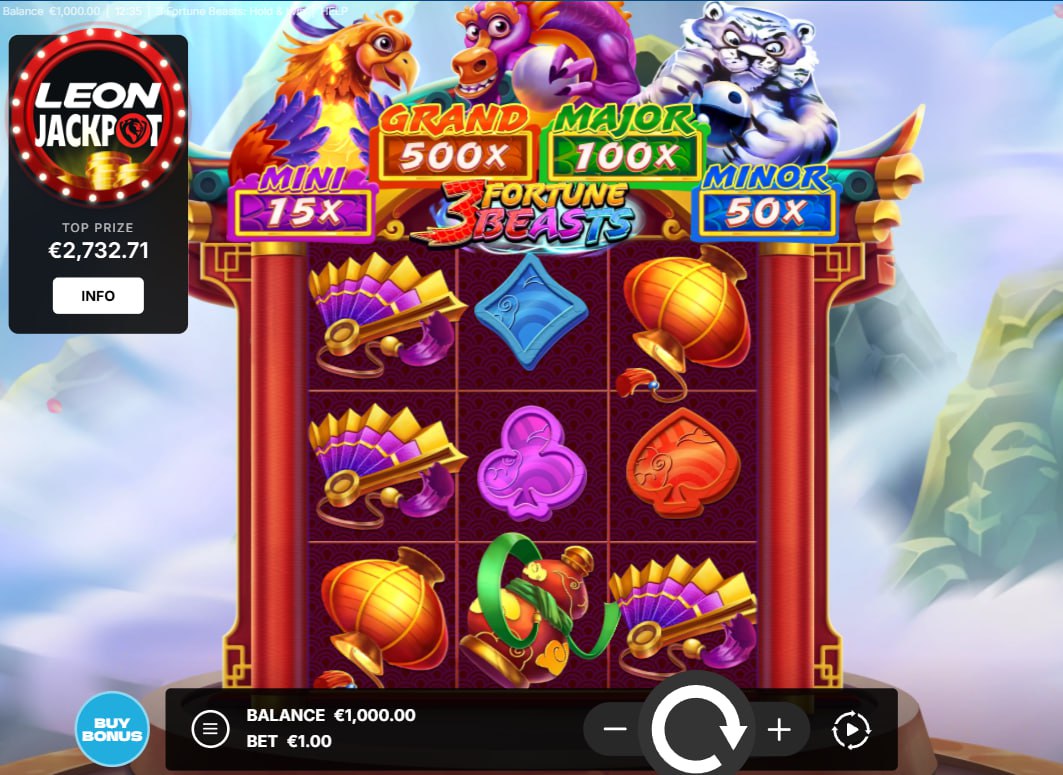 3 Fortune Beasts main 3x3 slot grid showing traditional Asian symbols and fixed Jackpot tiers on a mountain background.
