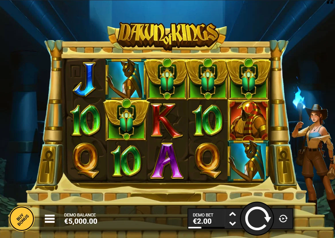 Dawn of Kings slot grid with Amy Dawn holding a torch next to five reels showing ancient Egyptian symbols and card ranks.