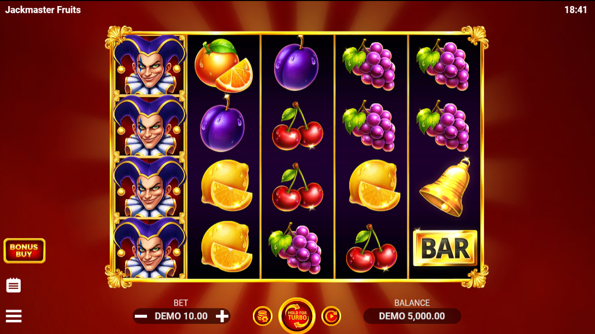 Full 5x3 grid of Jackmaster Fruits slot with Joker Wilds and fruit symbols on dark reels showing potential winning combinations.