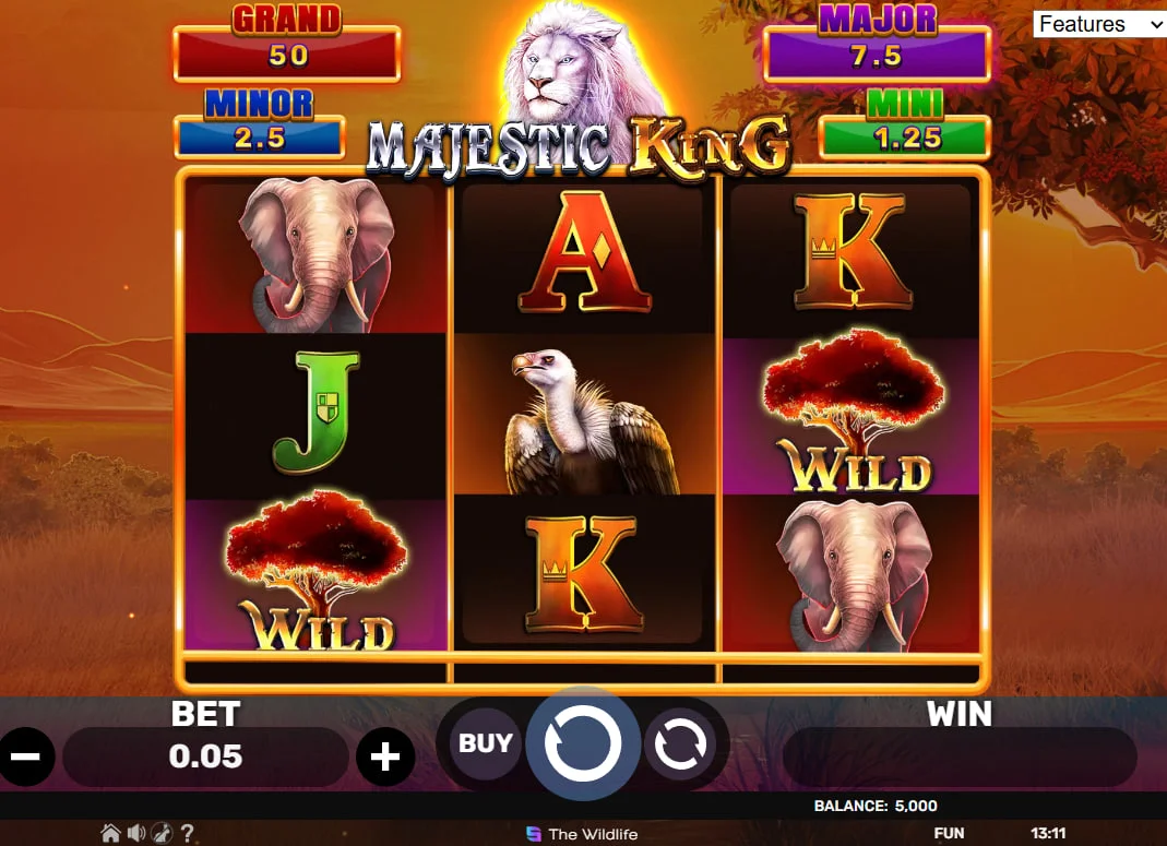 Majestic King Hold & Hit 3x3 slot main interface featuring elephant and vulture symbols on a 3x3 grid for high-speed safari betting